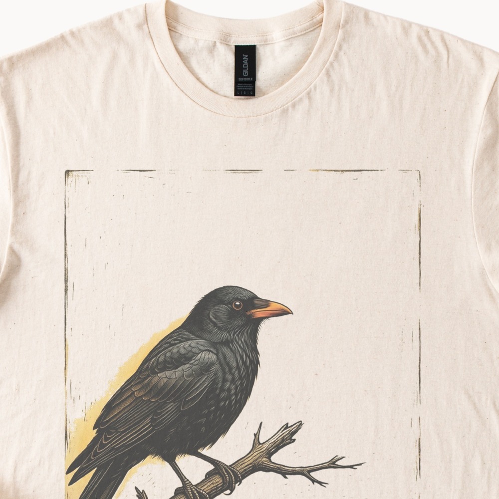 Black Bird Gripping a Bare Branch Amber Glow Tee